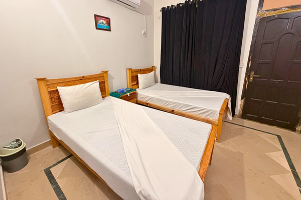 Deluxe Room with modern interior and comfortable bedding